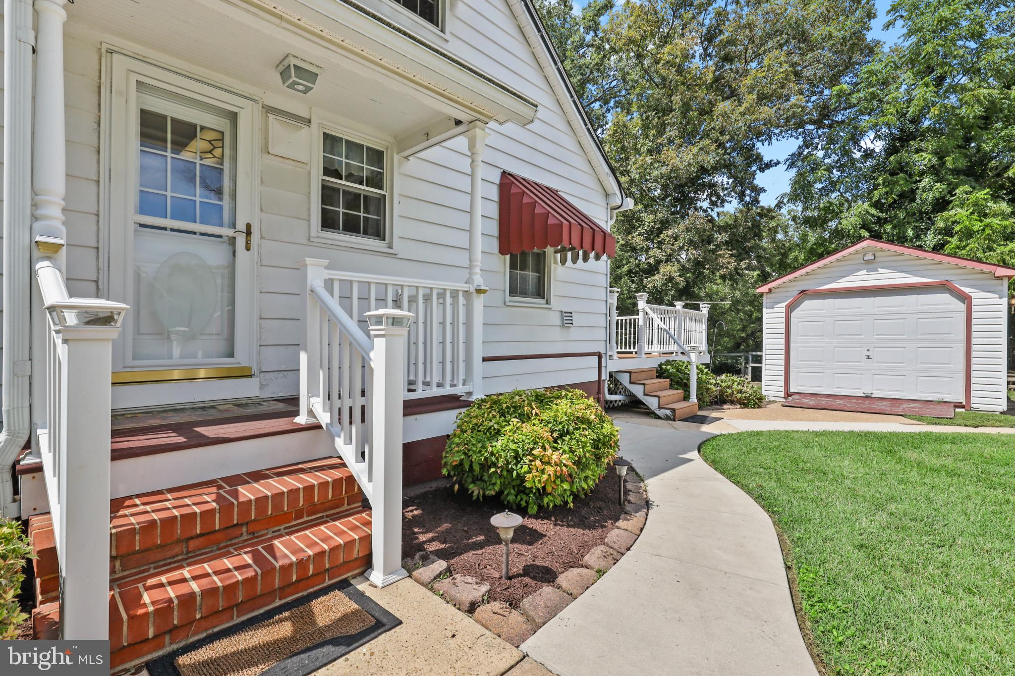 1058 Minnetonka Road Severn, MD 21144 - Photo 9 of 96 welcoming covered side porch & vinyl railings