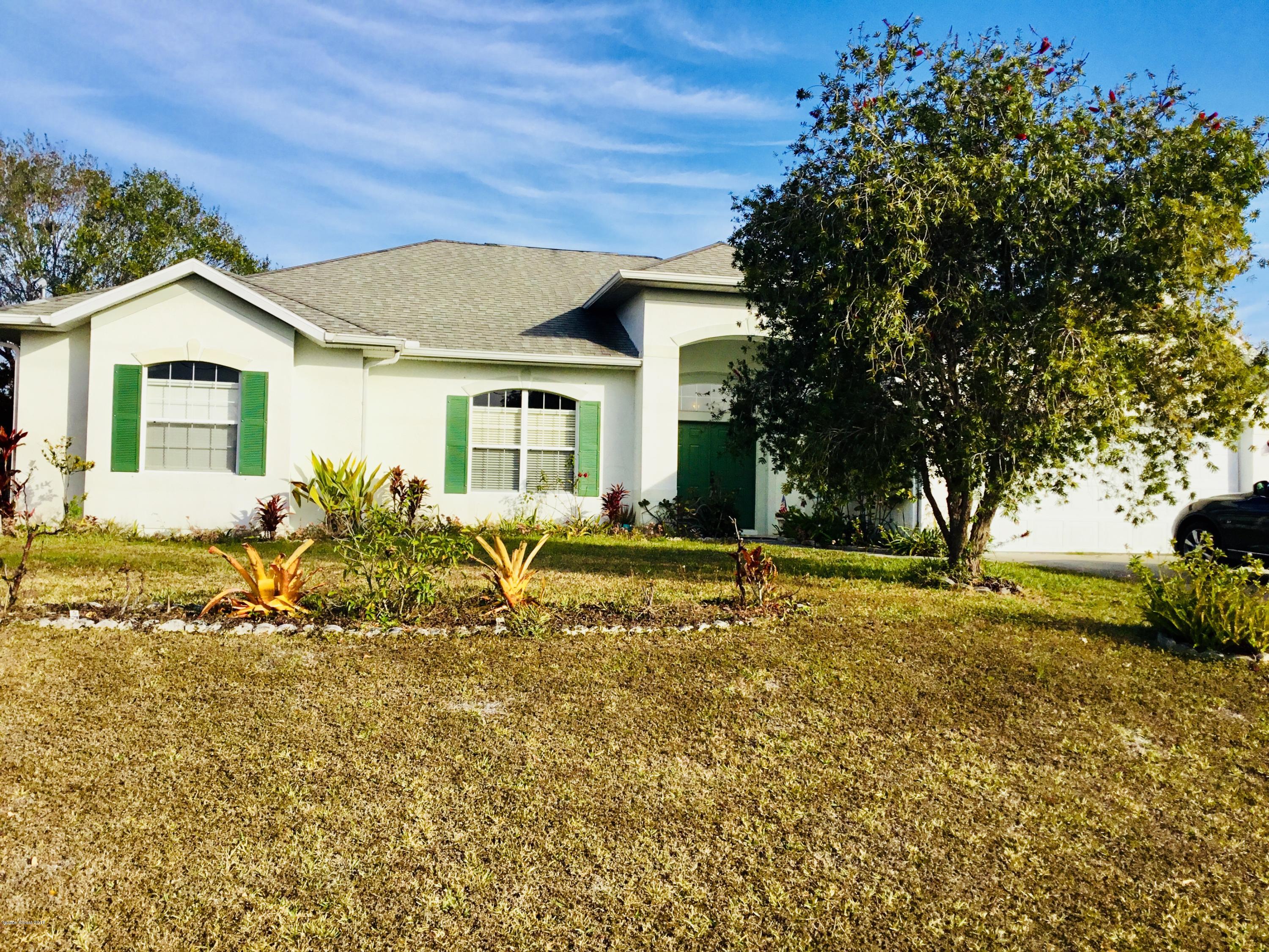 723 Raleigh Road Southeast Palm Bay, FL 32909 - Photo 1 of 15 EC791EFC-1950-44ED-A569-A6CBDD939534