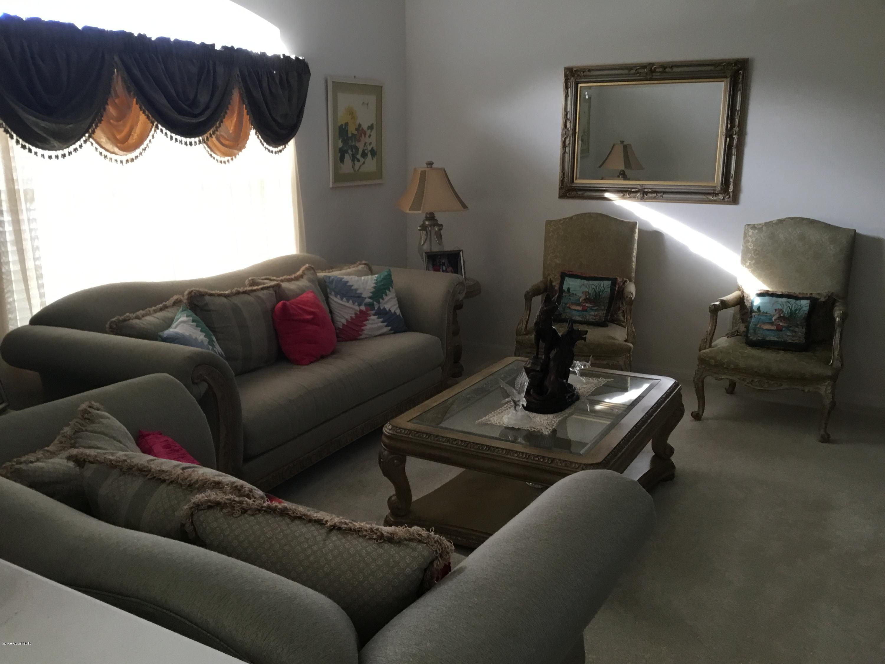 723 Raleigh Road Southeast Palm Bay, FL 32909 - Photo 2 of 15 AEE15F47-85F7-4678-B073-913F2B0D9FB3