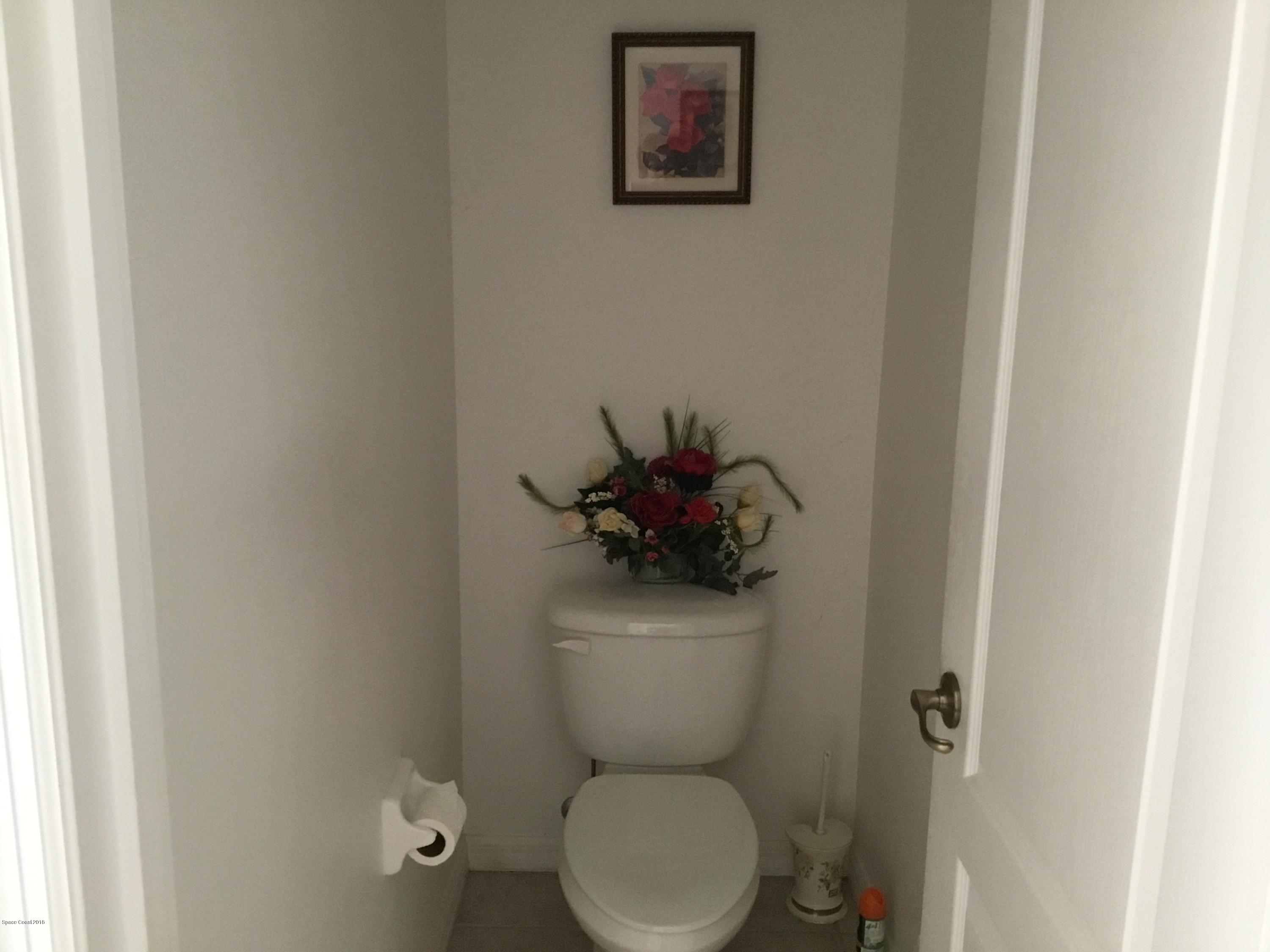 723 Raleigh Road Southeast Palm Bay, FL 32909 - Photo 11 of 15 47A86528-13A6-4545-9851-C7D42FC24344