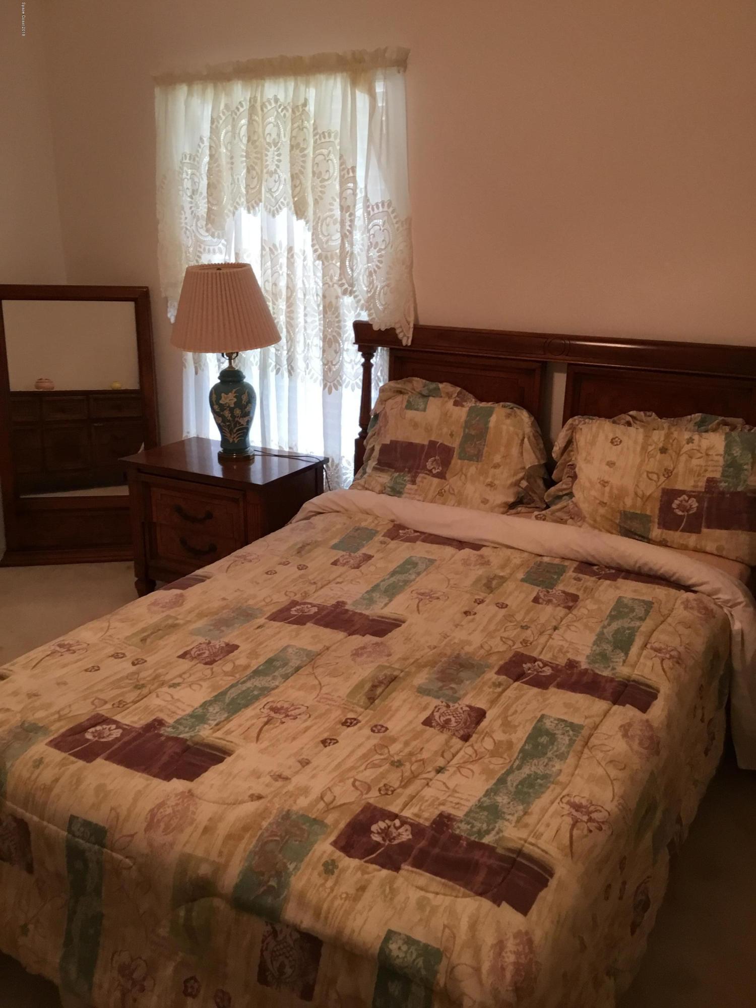 723 Raleigh Road Southeast Palm Bay, FL 32909 - Photo 14 of 15 A70B8B4D-4514-41D5-8FBB-508D89837AE9