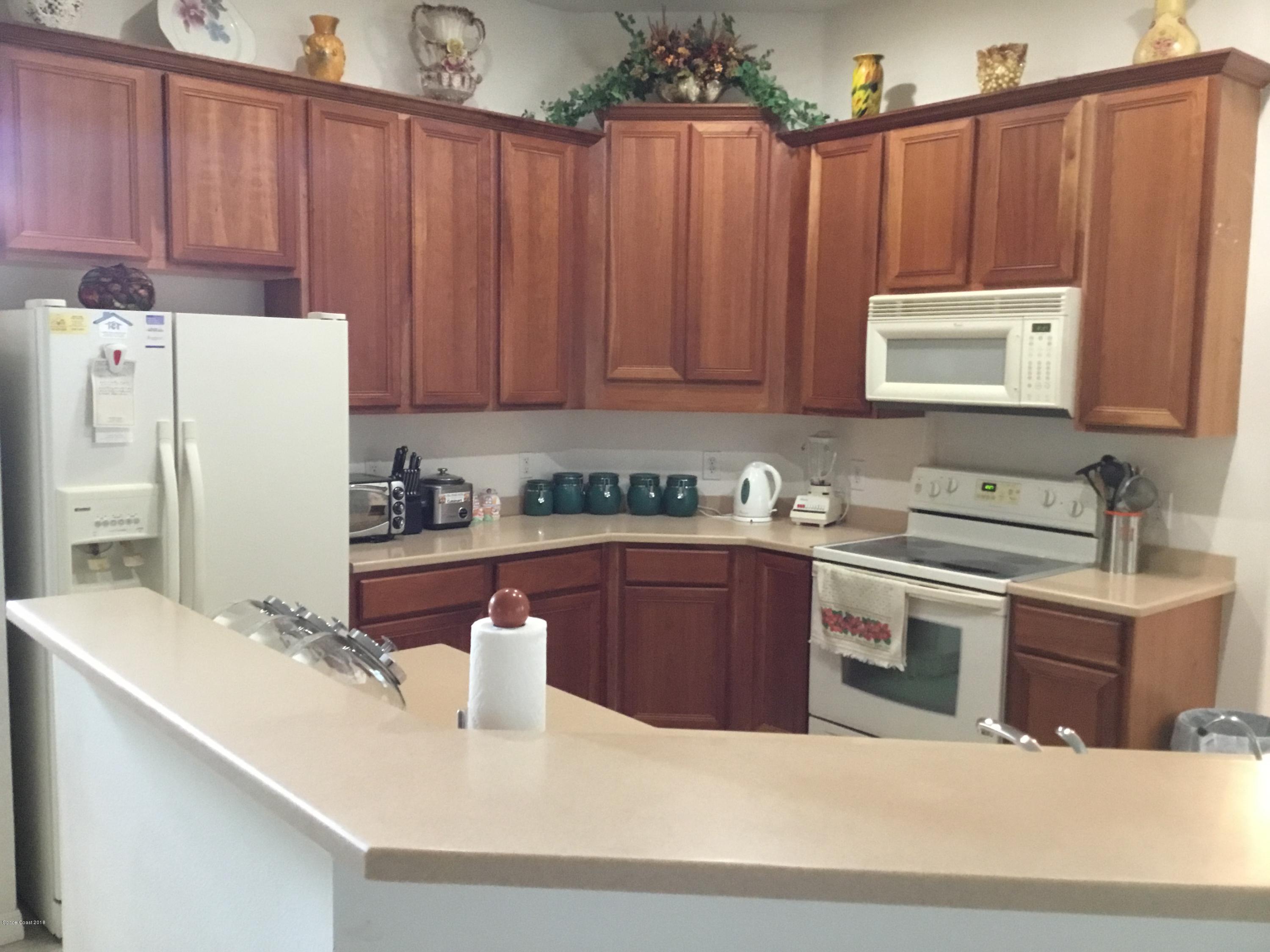 723 Raleigh Road Southeast Palm Bay, FL 32909 - Photo 4 of 15 31B2FB13-7D93-486E-9B98-2F2E7B71EFD4