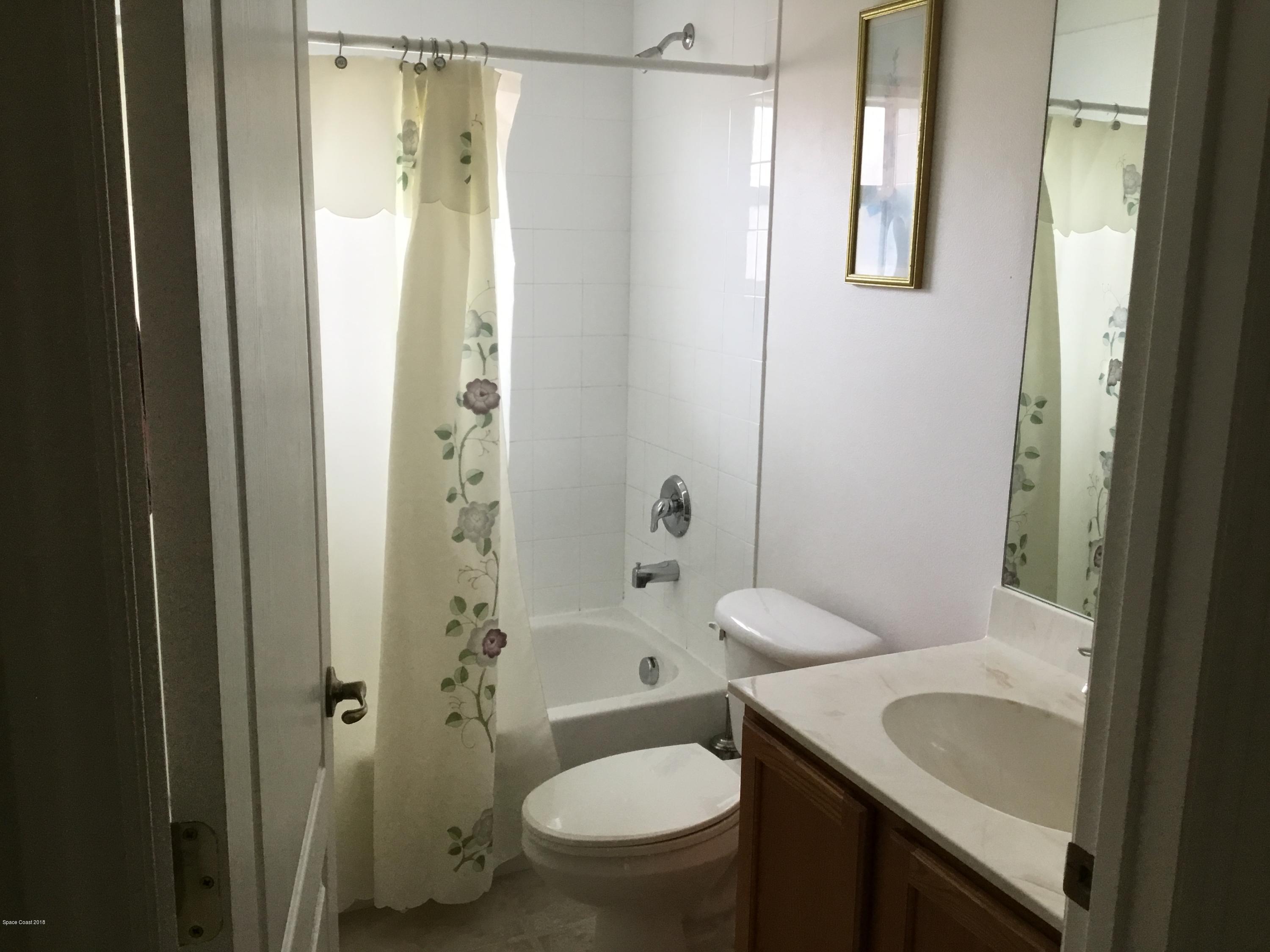 723 Raleigh Road Southeast Palm Bay, FL 32909 - Photo 6 of 15 404E306A-BFAD-42FB-9ED9-EBD07E922366