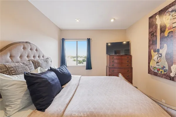 a bed room with a bed and a couch