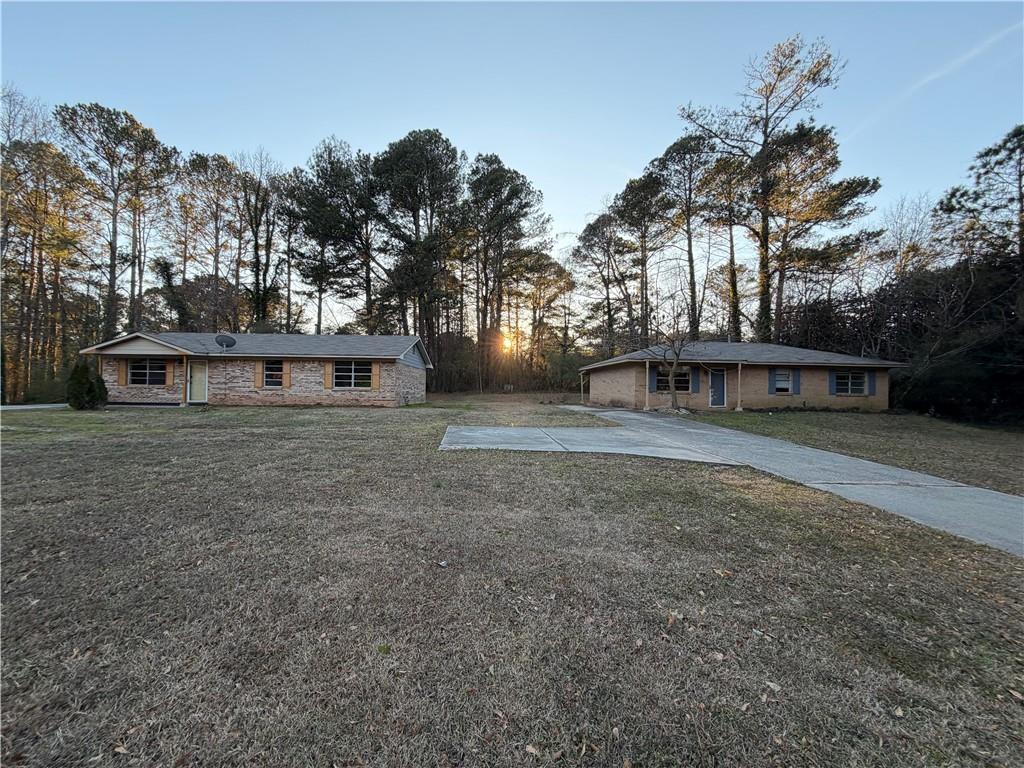 1765 Highpoint Road Snellville, GA 30078 - Photo 11 of 11 a view of a house with a yard