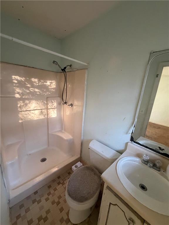 1765 Highpoint Road Snellville, GA 30078 - Photo 7 of 11 a bathroom with a sink toilet and shower