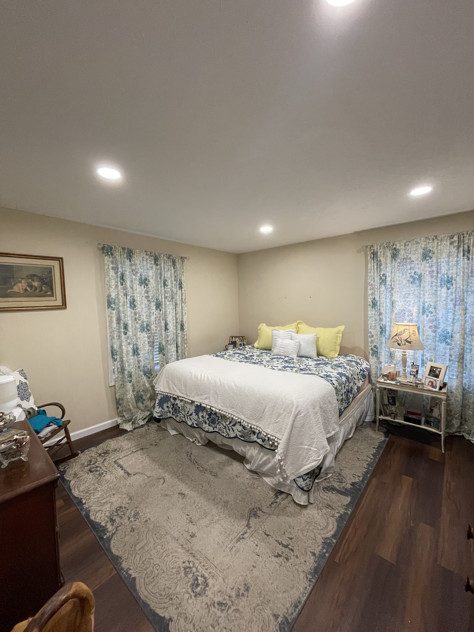 914 Freeman Street Lafayette, TN 37083 - Photo 11 of 12 a spacious bedroom with a bed and wooden floor