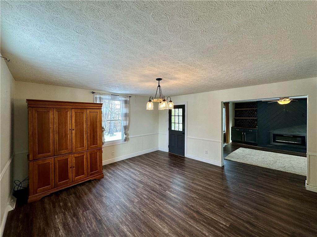 3758 Ellwood Road New Castle, PA 16101 - Photo 15 of 33 an empty room with wooden floor closet and windows