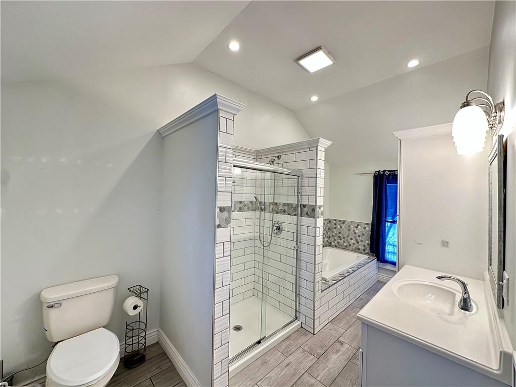 3758 Ellwood Road New Castle, PA 16101 - Photo 20 of 33 a bathroom with a granite countertop sink a toilet and shower