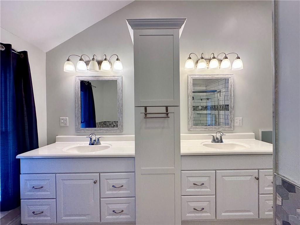 3758 Ellwood Road New Castle, PA 16101 - Photo 22 of 33 a bathroom with a sink vanity and mirror