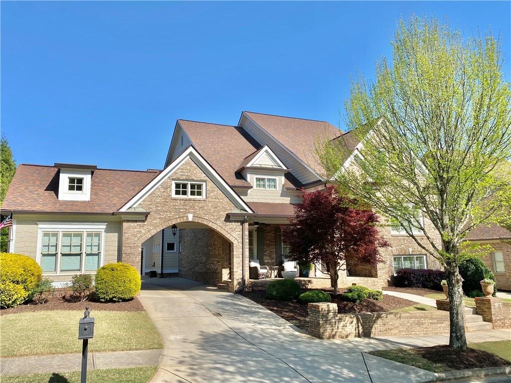 311 Carmichael Circle Canton, GA 30115 - Photo 1 of 1 a front view of a building with outdoor seating
