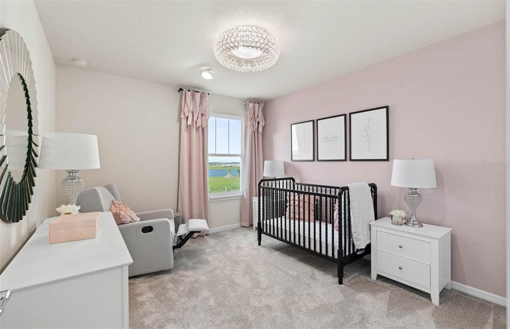 1452 Hamilton Way Lake Alfred, FL 33850 - Photo 12 of 24 a bedroom with a bed and a window