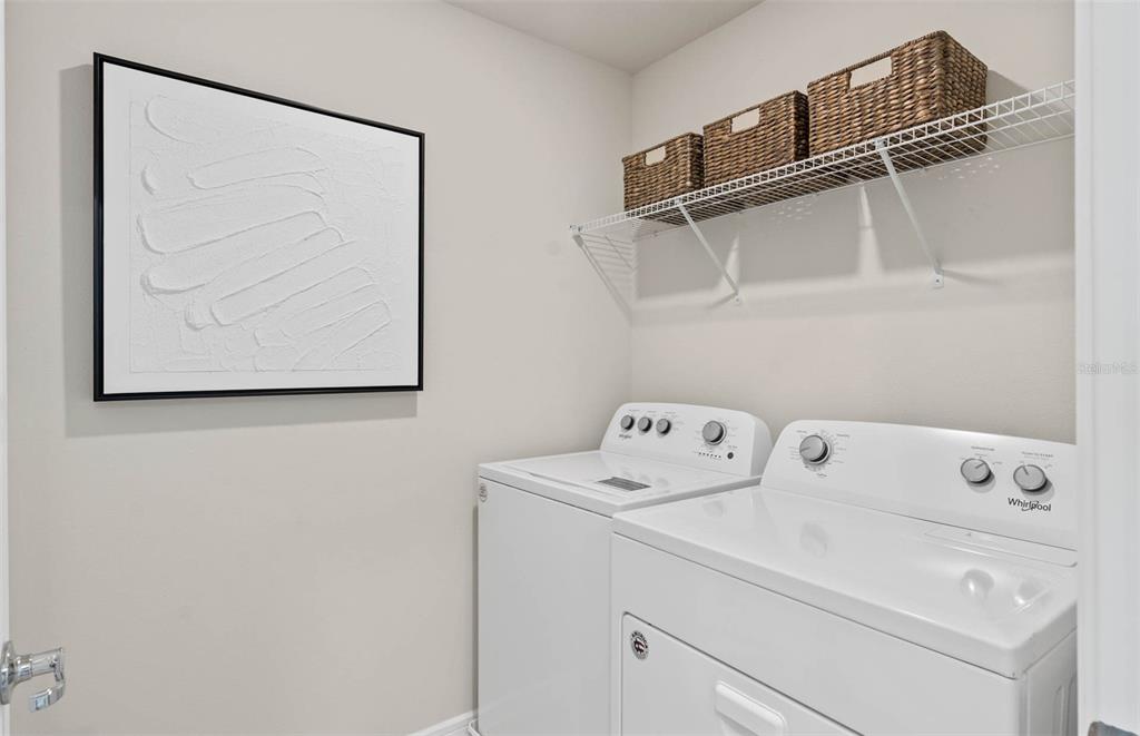 1452 Hamilton Way Lake Alfred, FL 33850 - Photo 13 of 24 a utility room with dryer and washer