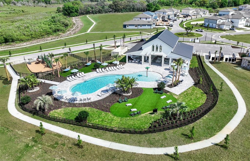 1452 Hamilton Way Lake Alfred, FL 33850 - Photo 14 of 24 an aerial view of a house with a garden and lake view