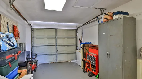 a view of a yard and garage