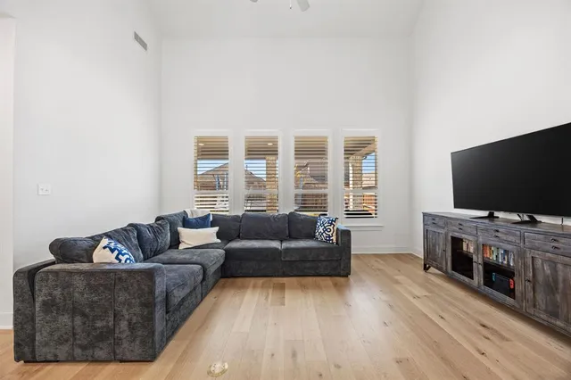 a living room with furniture and a couch