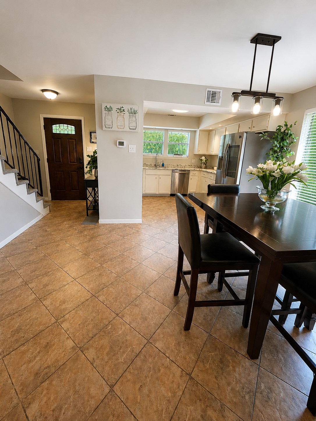 23907 Spring Mill Lane Spring, TX 77373 - Photo 9 of 28 From the dining area, you can look out and see nature from the front, side and back windows and door.