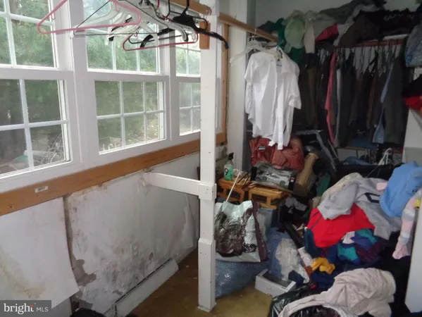 a utility room with a sink washer and dryer