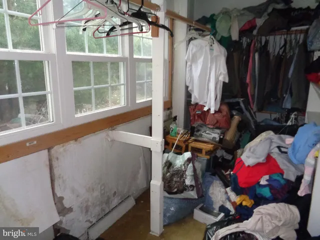 a utility room with a sink washer and dryer
