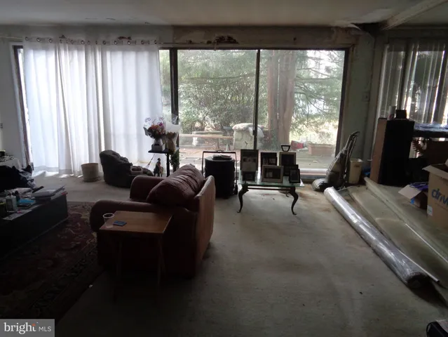 a room with furniture and a window