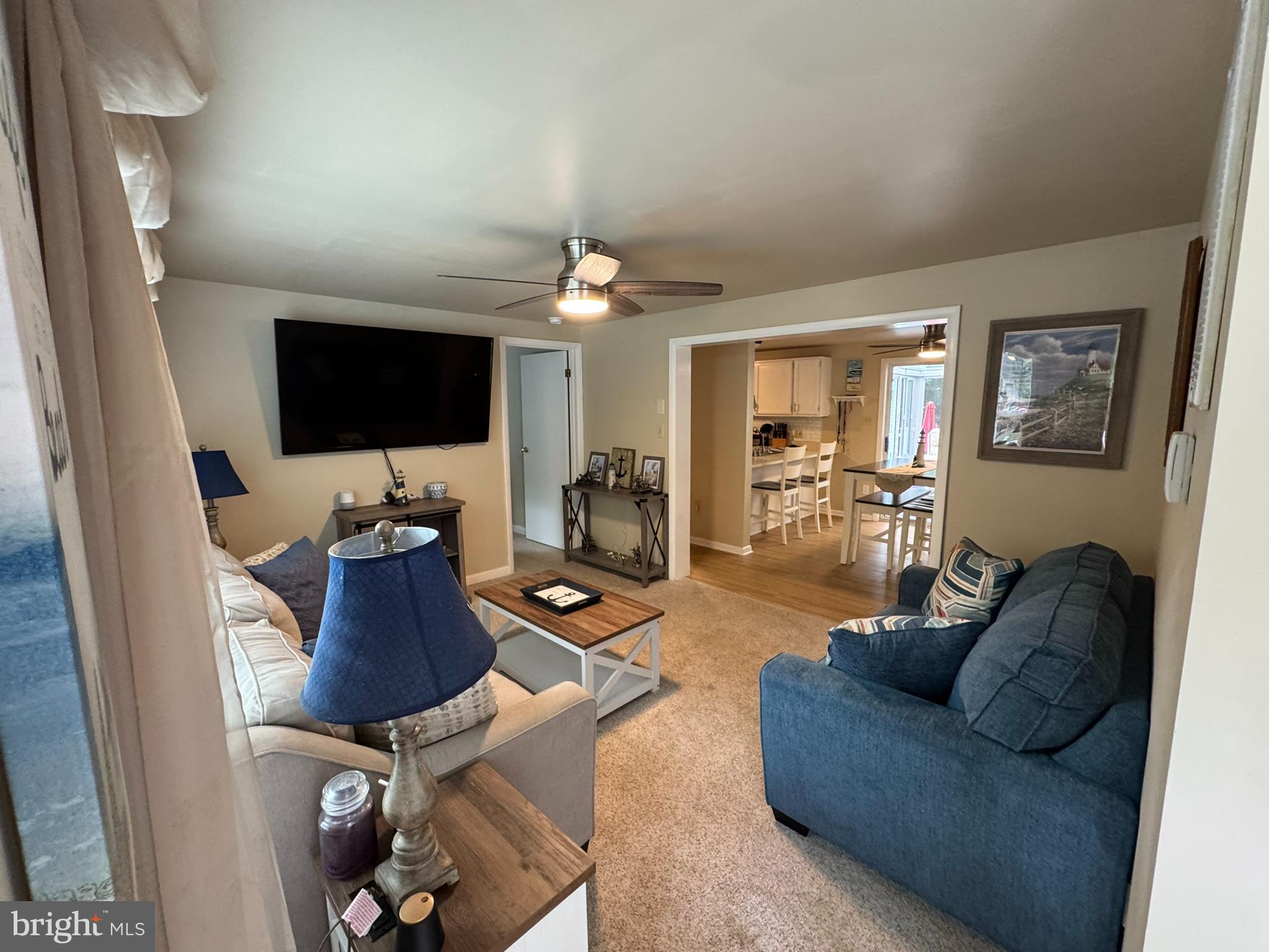 85 Pinehurst Road Ocean Pines, MD 21811 - Photo 14 of 30 a living room with furniture and a flat screen tv