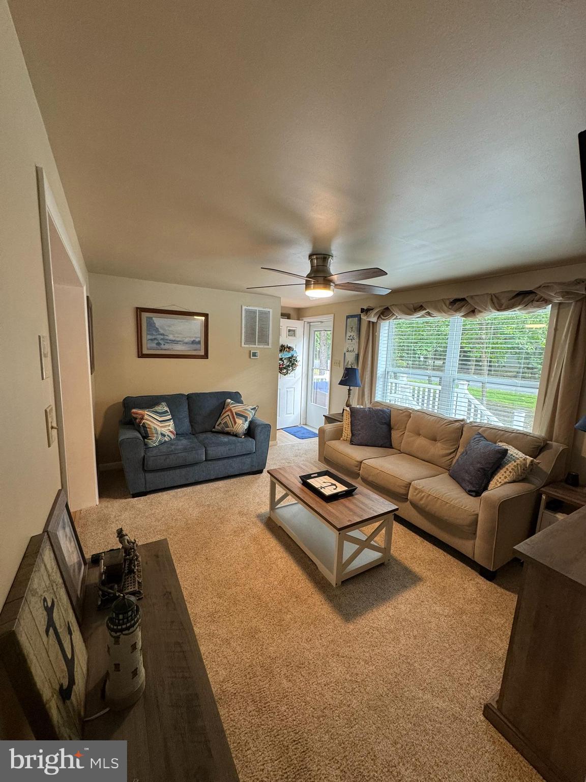 85 Pinehurst Road Ocean Pines, MD 21811 - Photo 15 of 30 a living room with furniture and a large window