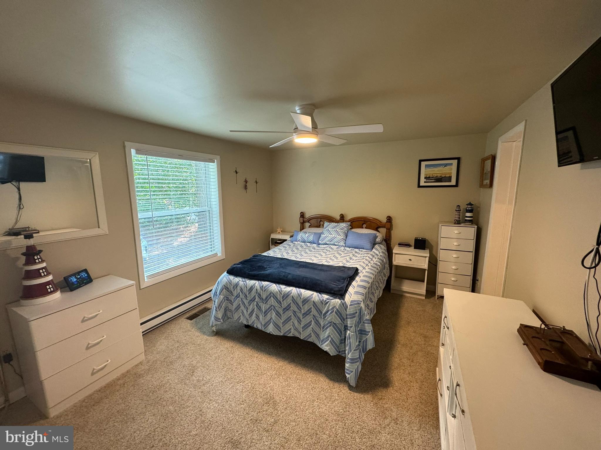 85 Pinehurst Road Ocean Pines, MD 21811 - Photo 16 of 30 a bedroom with furniture and a window
