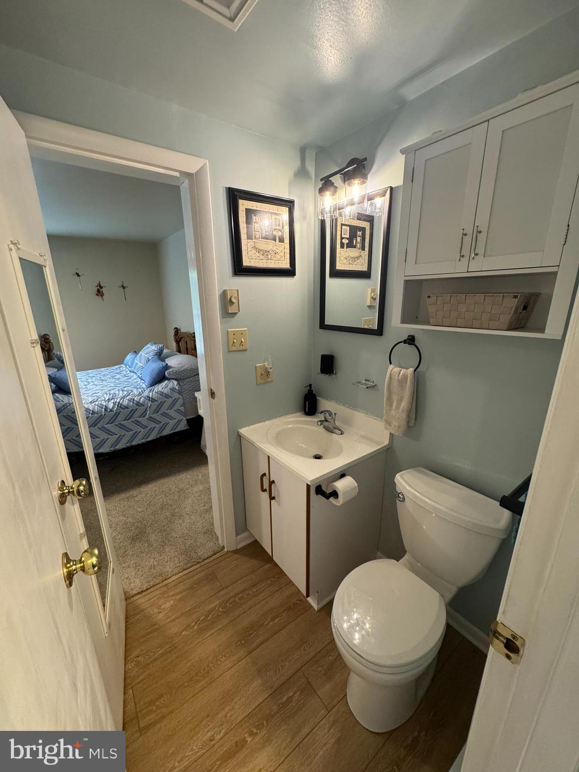 85 Pinehurst Road Ocean Pines, MD 21811 - Photo 19 of 30 a bathroom with a sink toilet and mirror