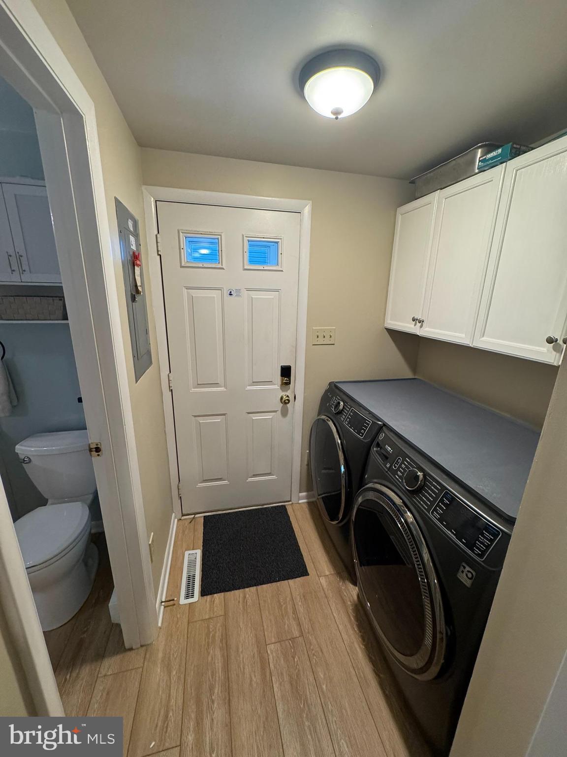 85 Pinehurst Road Ocean Pines, MD 21811 - Photo 20 of 30 a view of a storage and utility room with washer and dryer