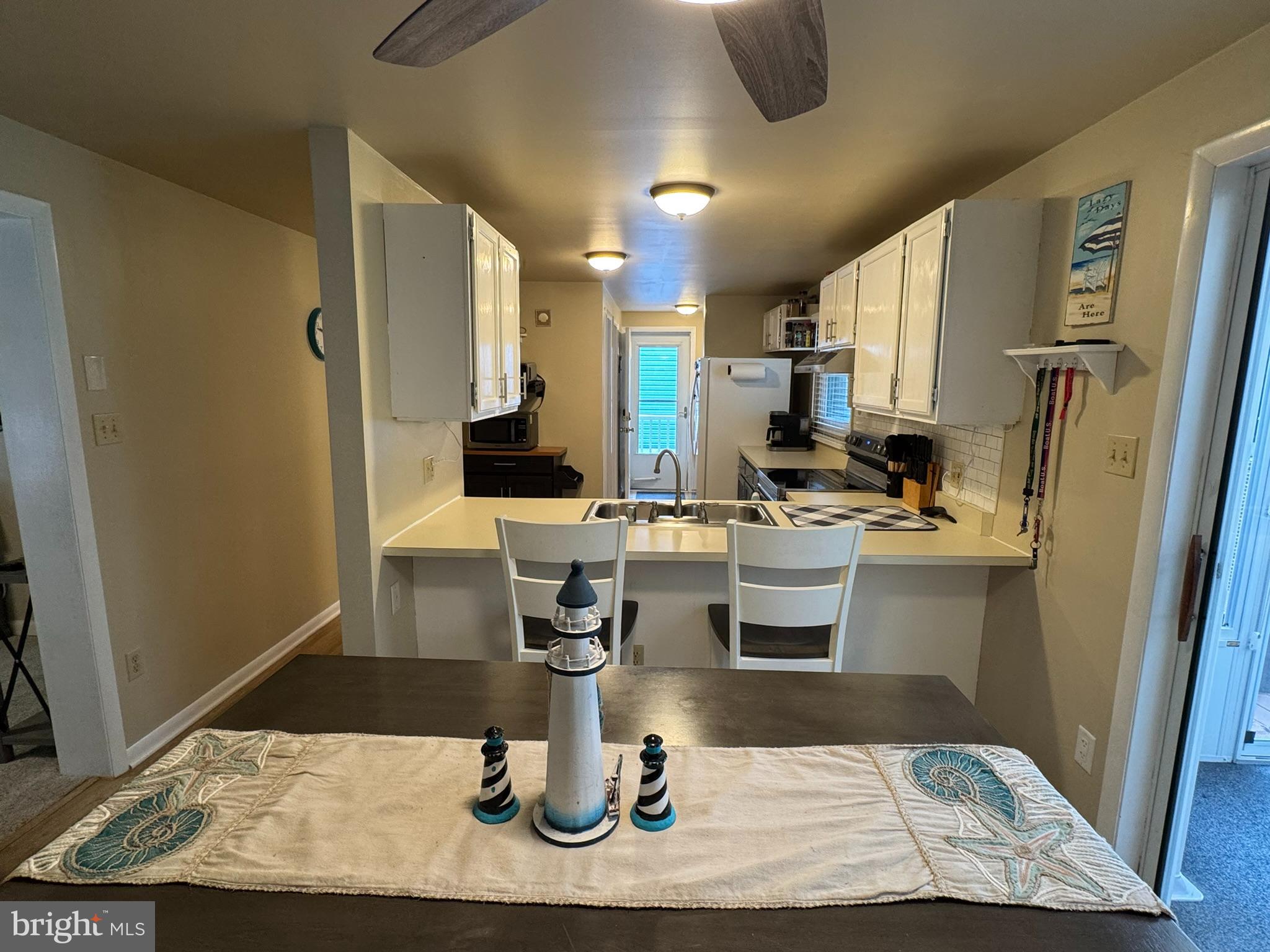 85 Pinehurst Road Ocean Pines, MD 21811 - Photo 22 of 30 a kitchen with a sink appliances and cabinets