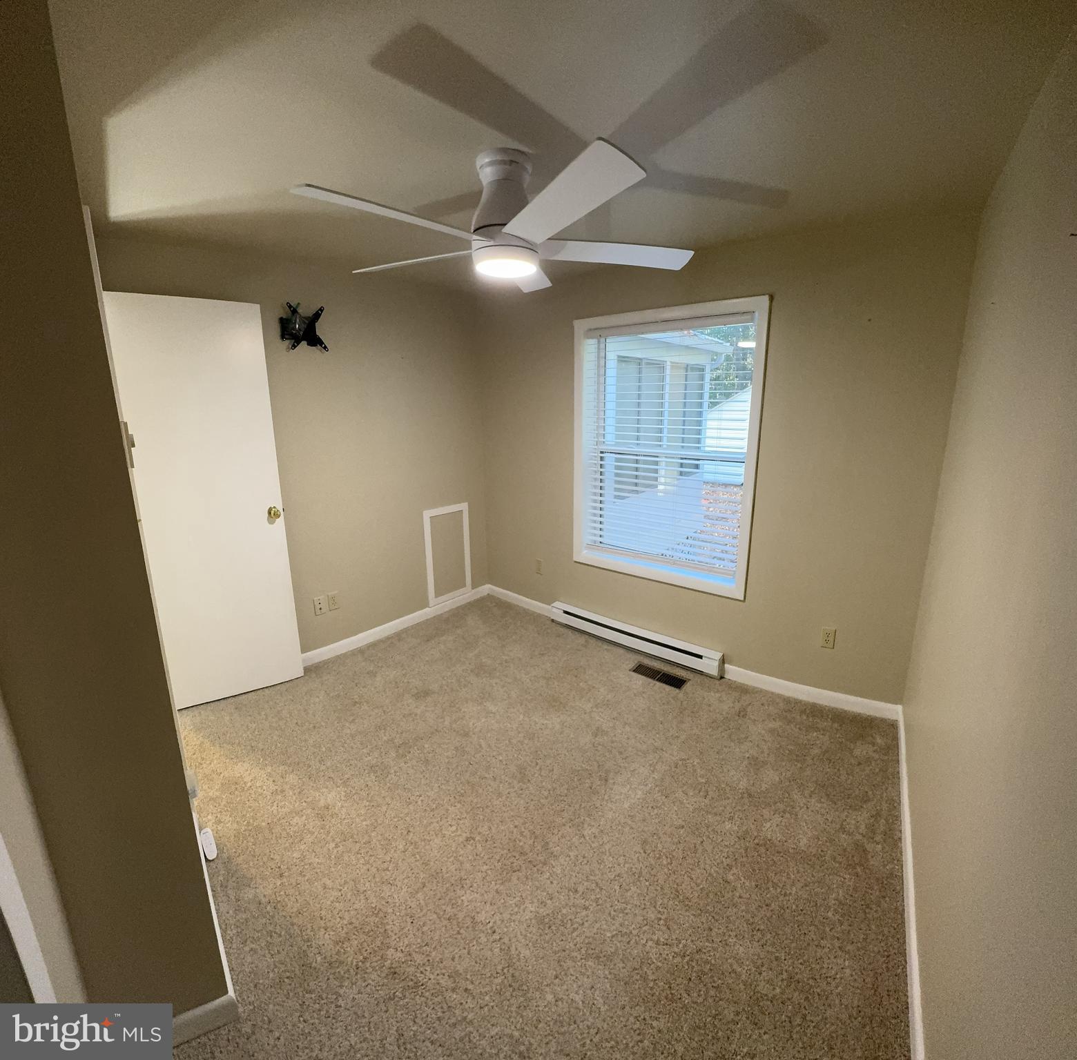 85 Pinehurst Road Ocean Pines, MD 21811 - Photo 24 of 30 an empty room with a natural light