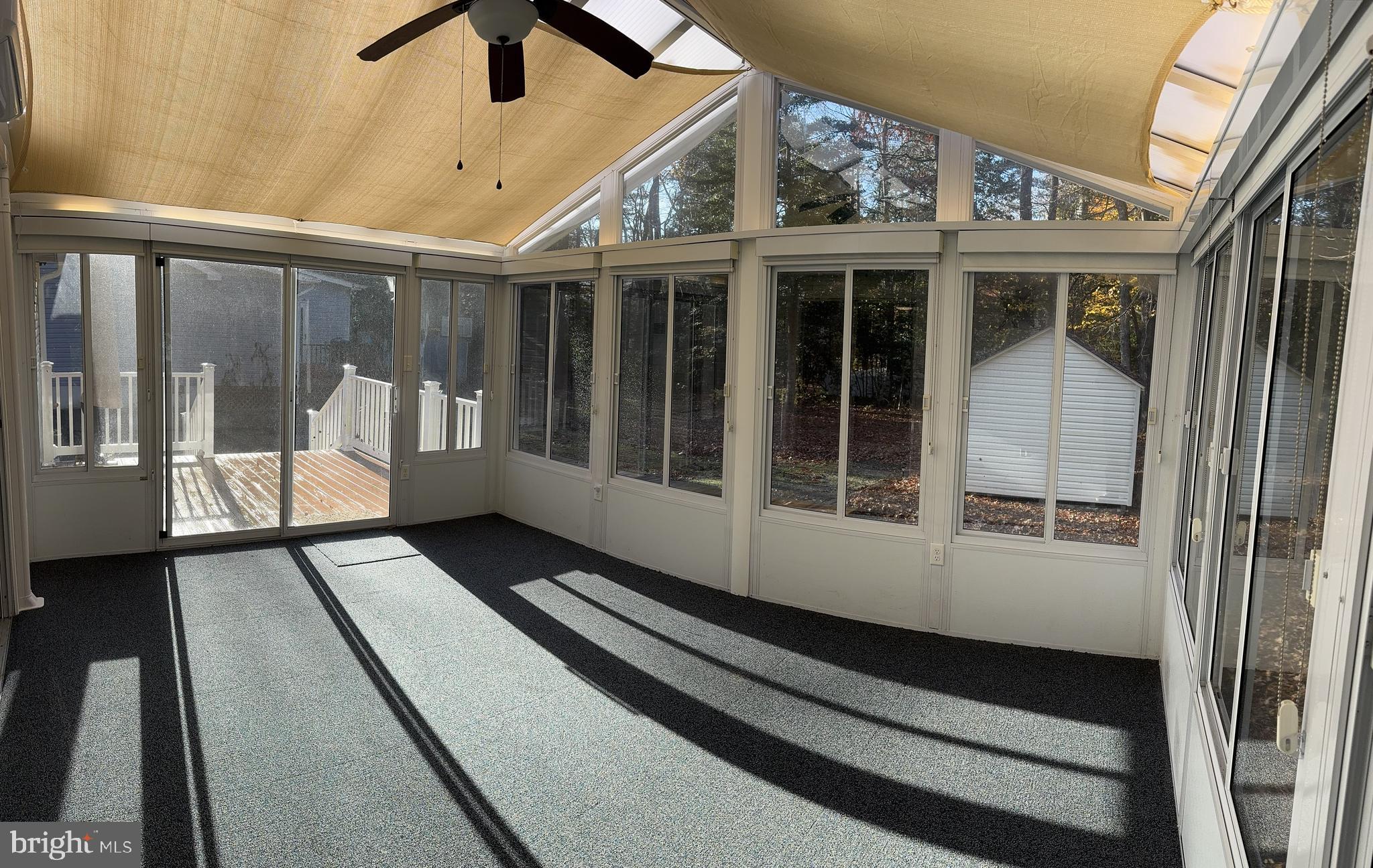 85 Pinehurst Road Ocean Pines, MD 21811 - Photo 5 of 30 a view of a balcony with wooden floor and fence