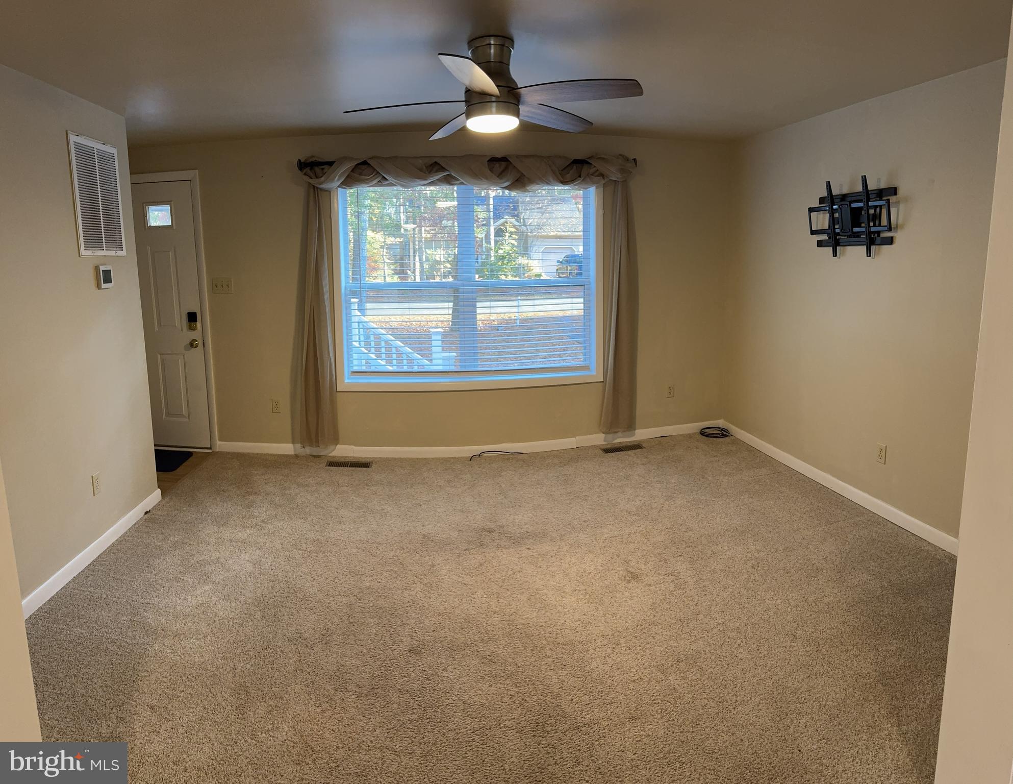 85 Pinehurst Road Ocean Pines, MD 21811 - Photo 9 of 30 a view of an empty room with a window