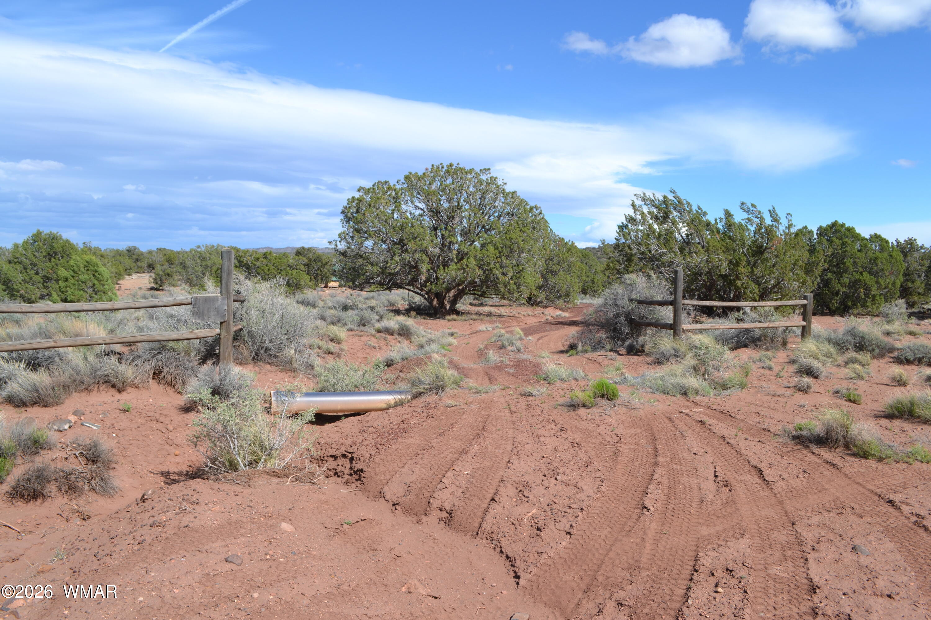 32 N8544 Concho, AZ 85924 - Photo 18 of 21 a view of a dry yard with wooden fence