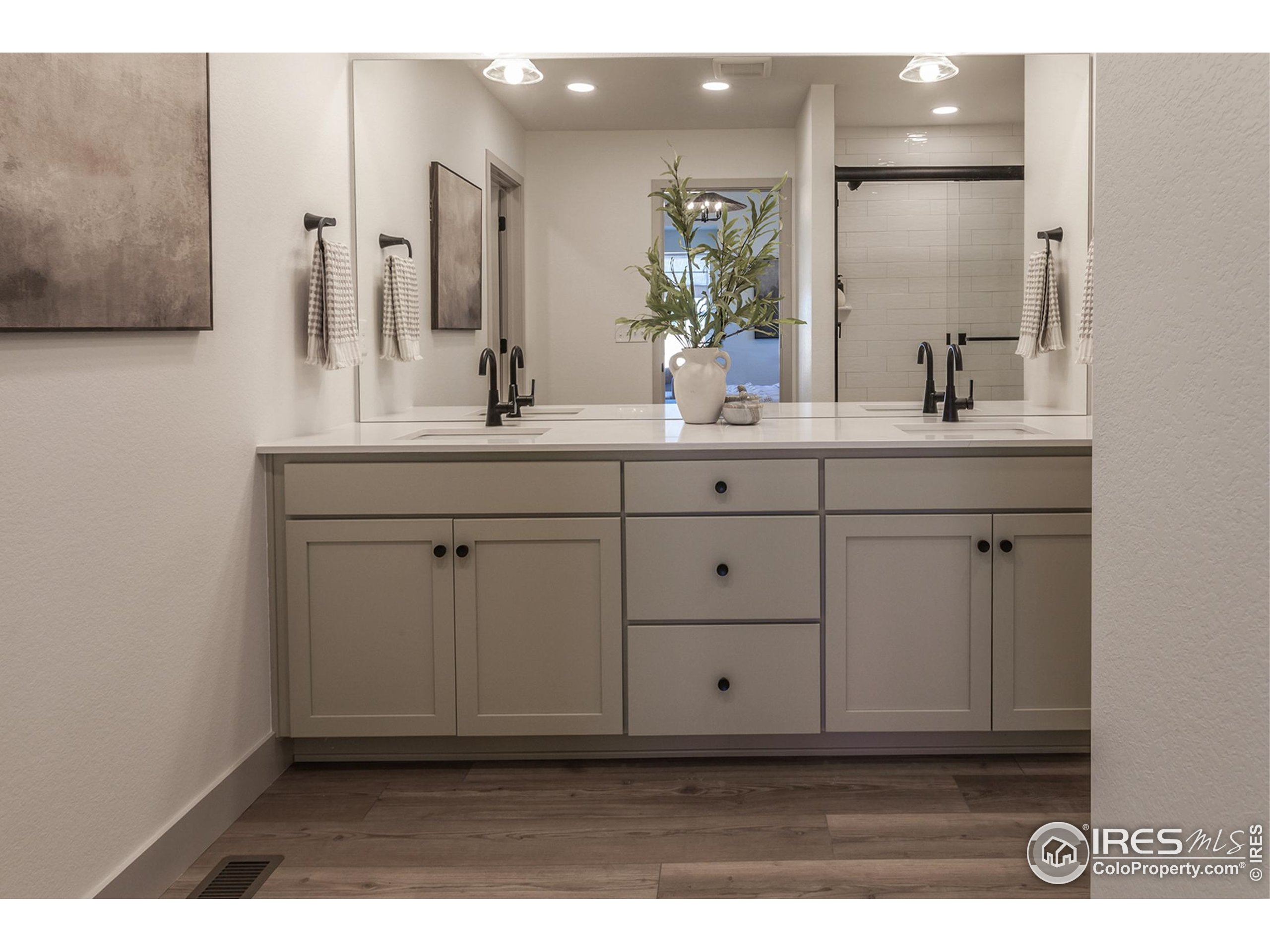 6079 Red Barn Road Fort Collins, CO 80528 - Photo 26 of 41 a bathroom with a sink and a mirror