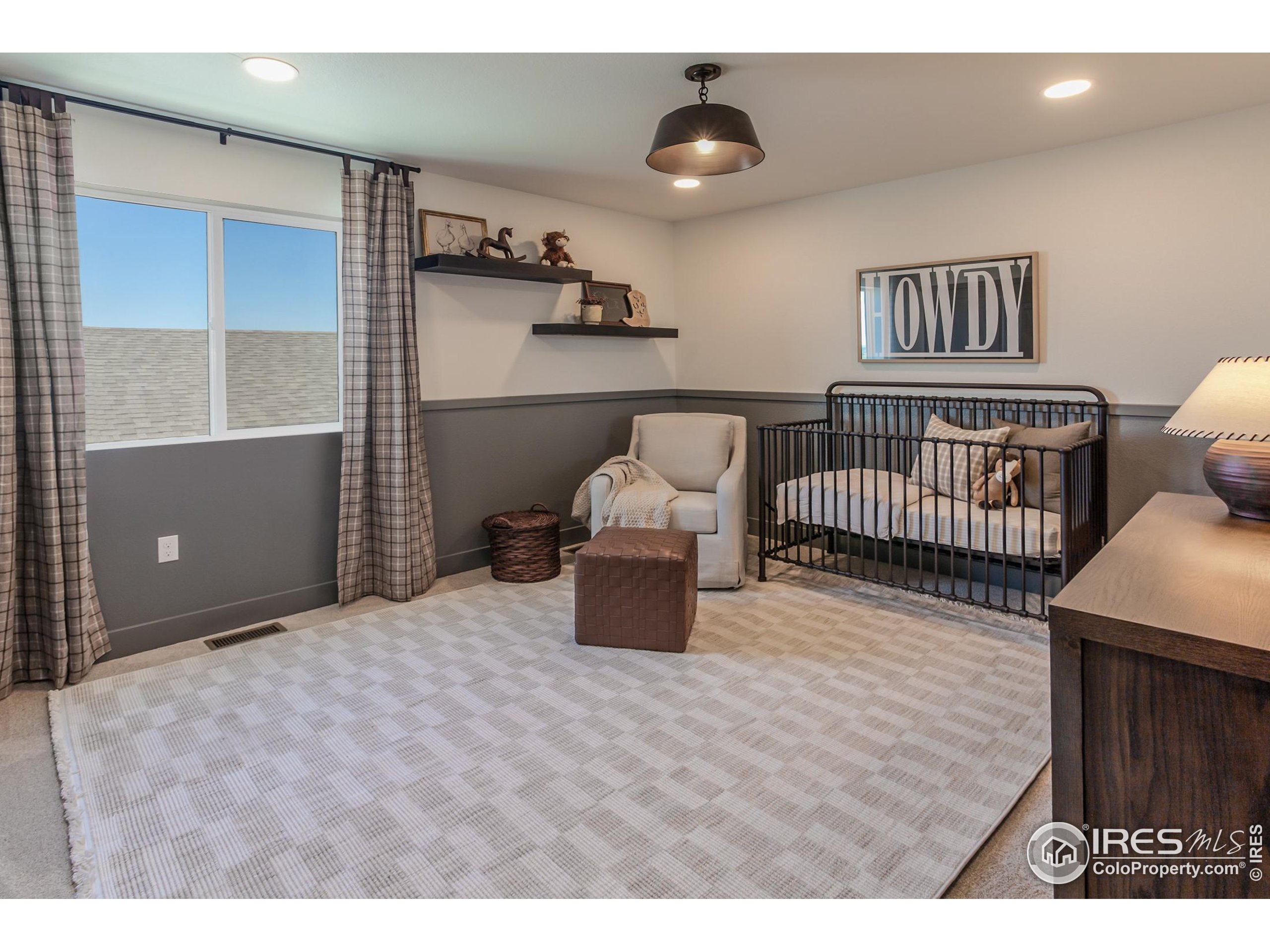 6079 Red Barn Road Fort Collins, CO 80528 - Photo 30 of 41 a bedroom with furniture and a window