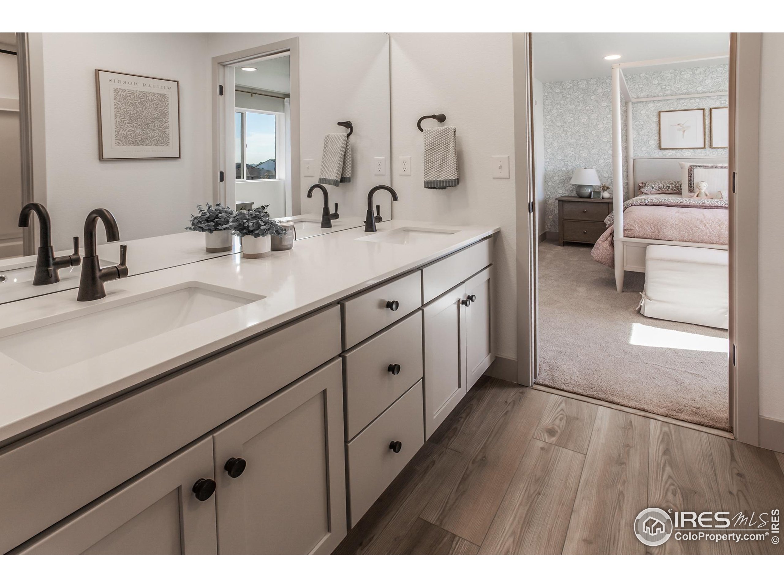 6079 Red Barn Road Fort Collins, CO 80528 - Photo 31 of 41 a spacious bathroom with double sink and a mirror