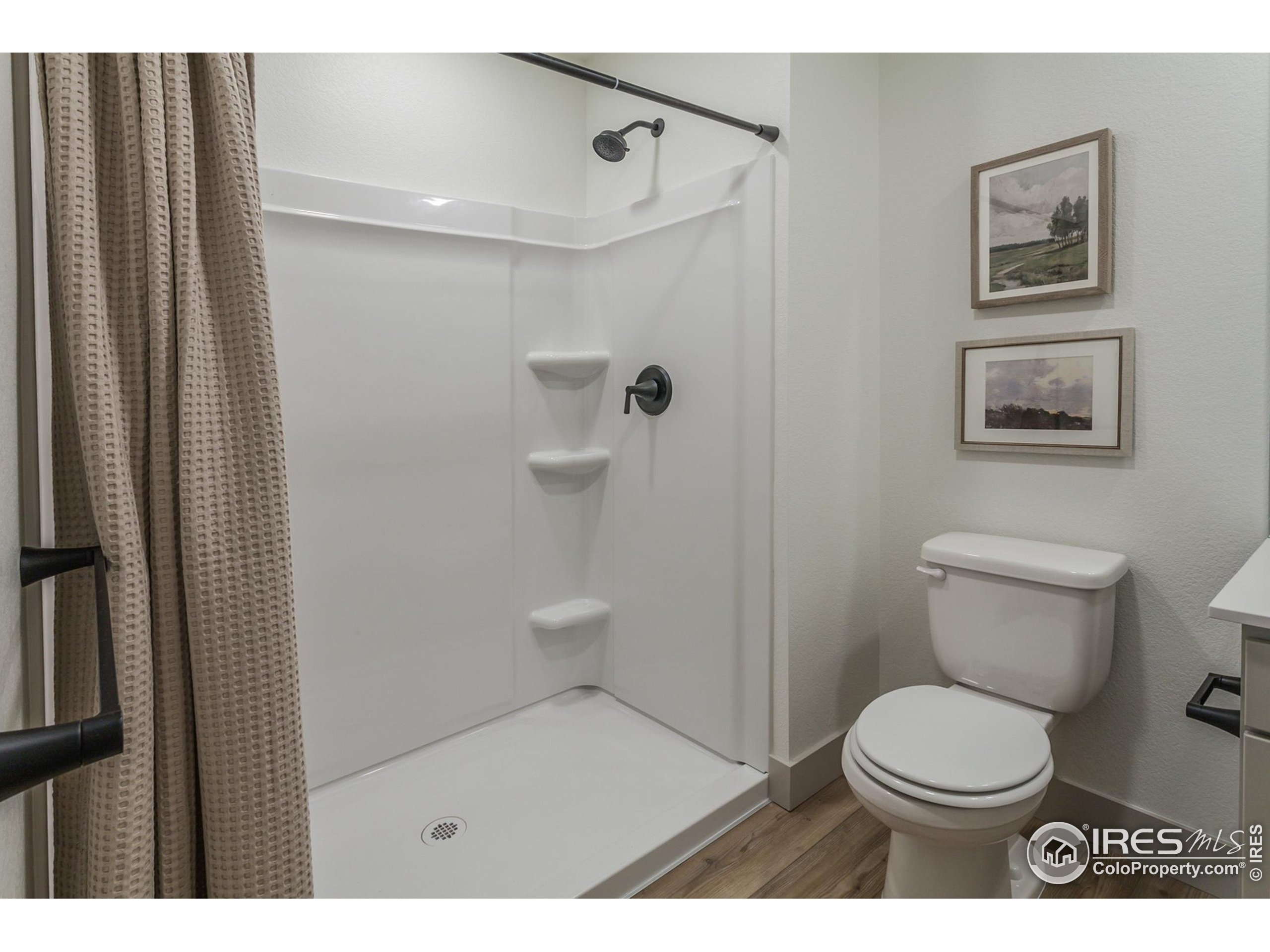 6079 Red Barn Road Fort Collins, CO 80528 - Photo 35 of 41 a bathroom with a toilet and a shower