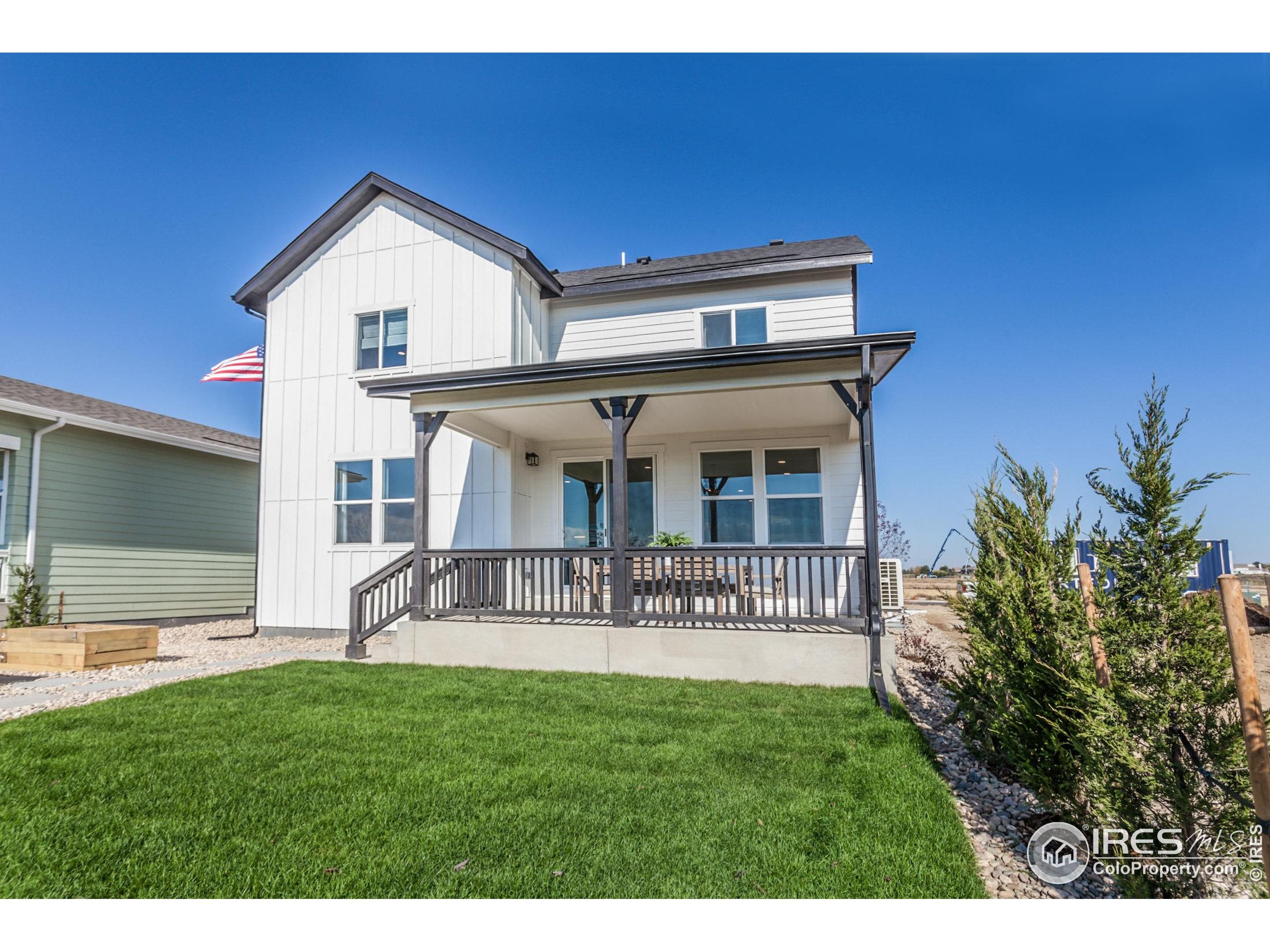 6079 Red Barn Road Fort Collins, CO 80528 - Photo 37 of 41 a front view of a house with garden