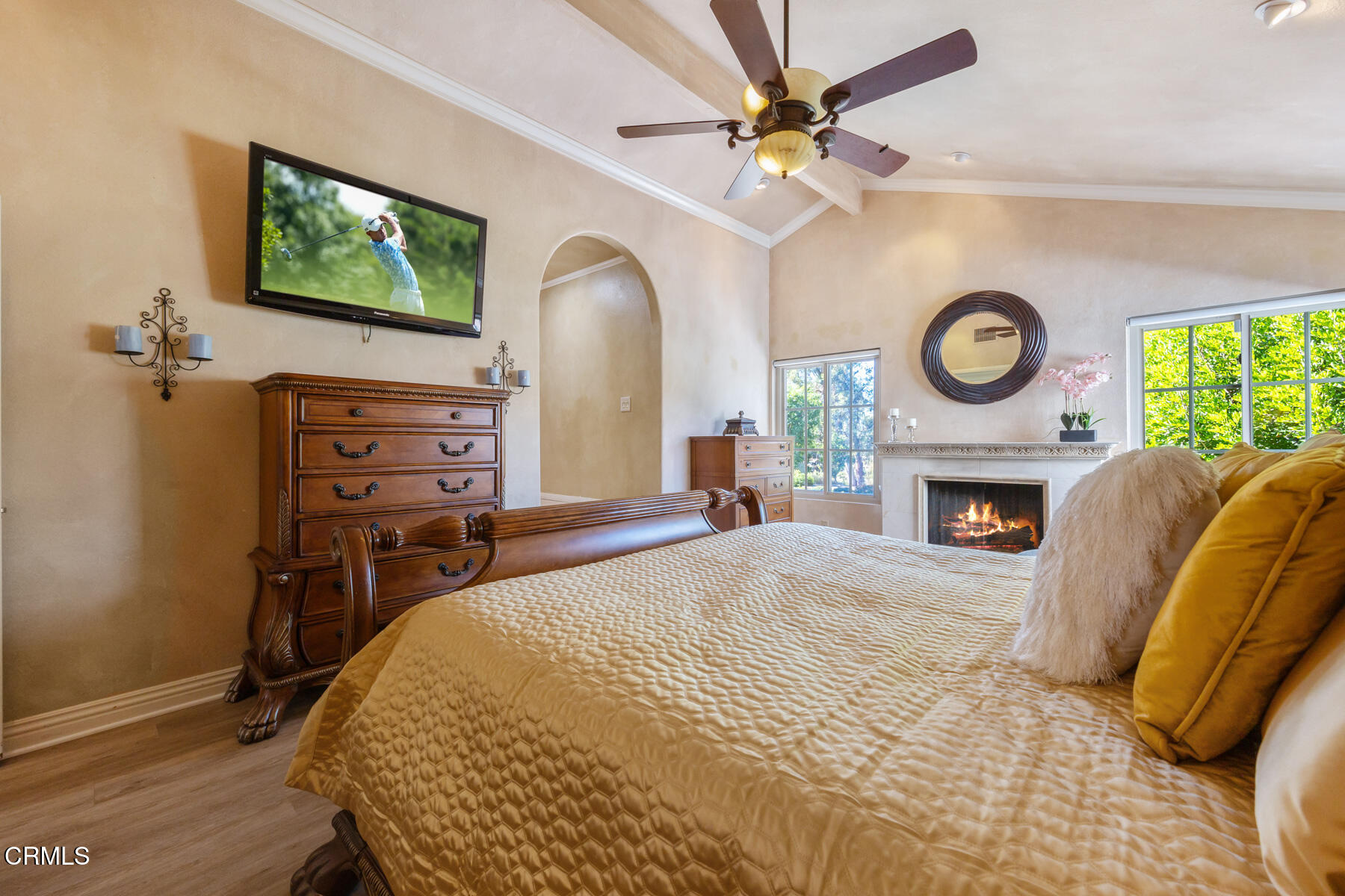 22671 Cheryl Way Lake Forest, CA 92630 - Photo 24 of 51 a bedroom with a bed and a fireplace