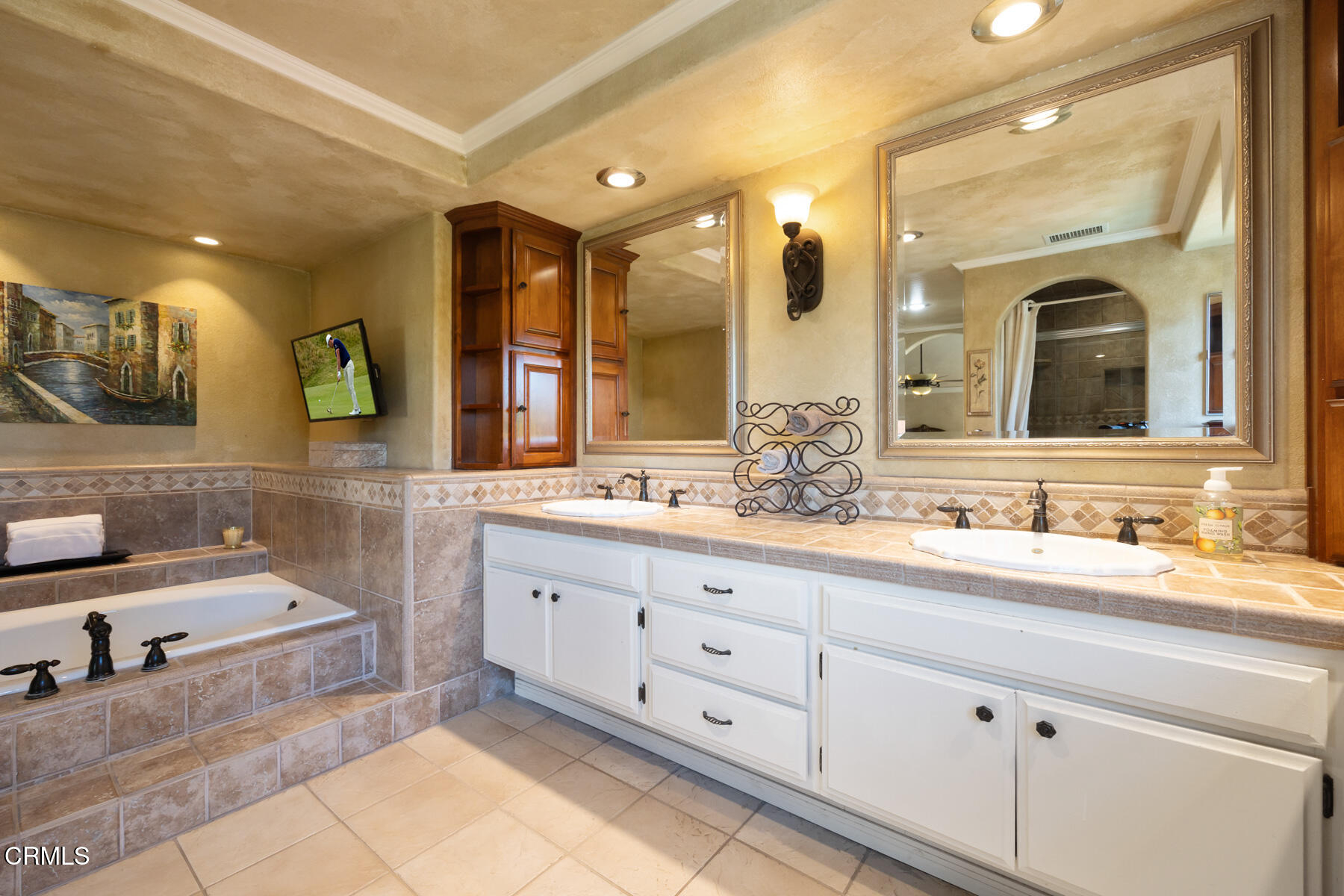 22671 Cheryl Way Lake Forest, CA 92630 - Photo 29 of 51 a bathroom with a sink and a mirror