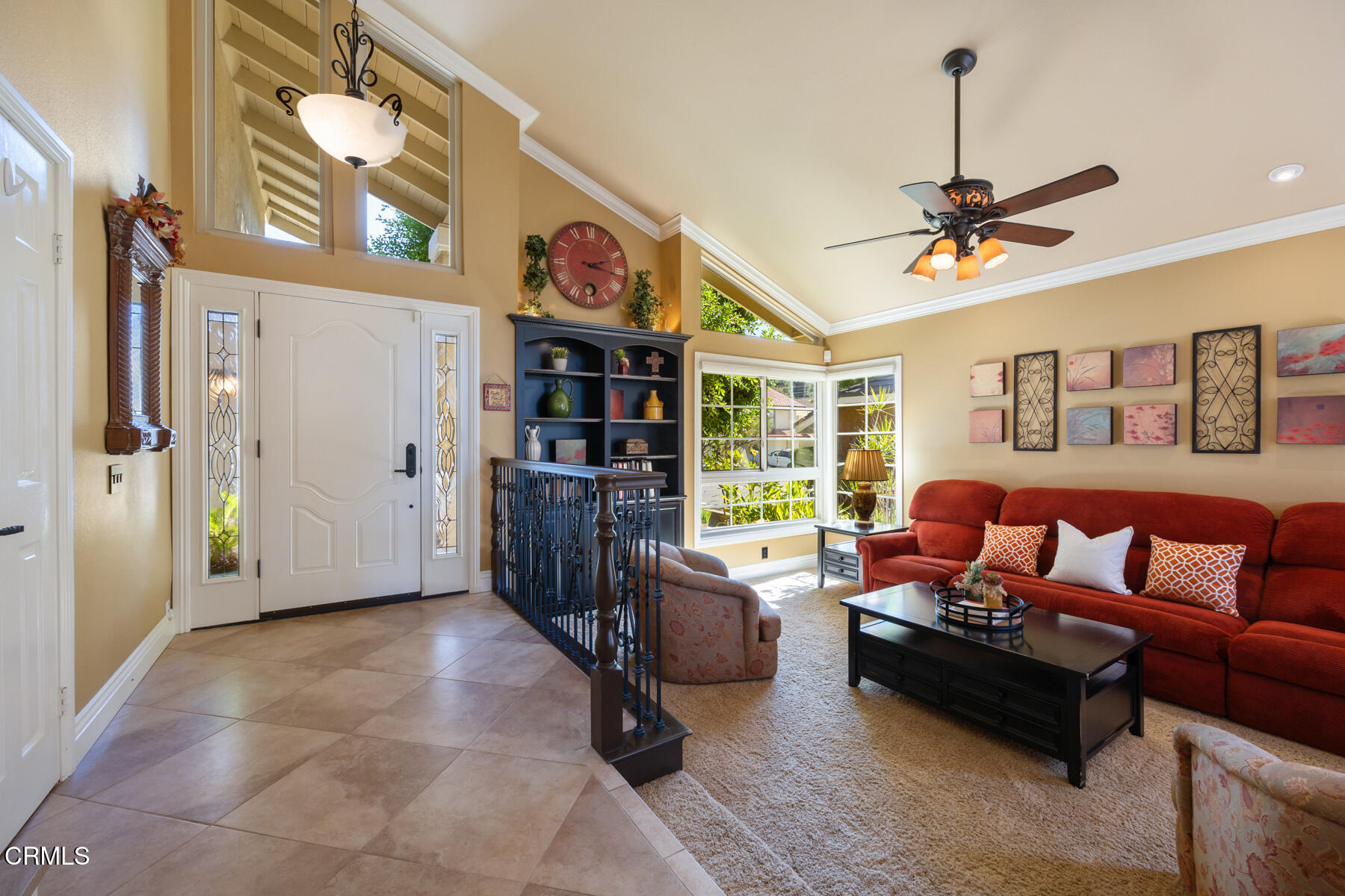 22671 Cheryl Way Lake Forest, CA 92630 - Photo 3 of 51 a living room with furniture a chandelier and a window