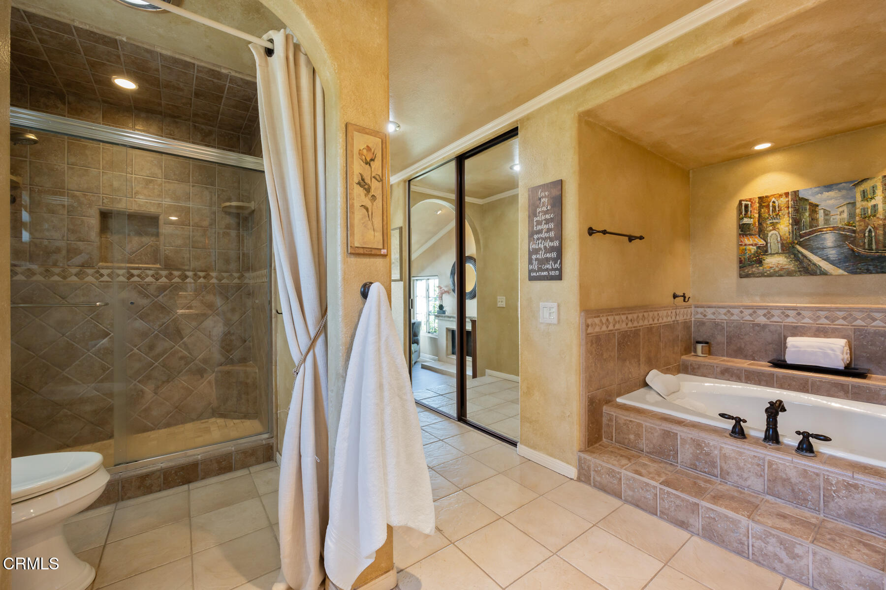 22671 Cheryl Way Lake Forest, CA 92630 - Photo 32 of 51 a bathroom with a double vanity sink toilet and shower