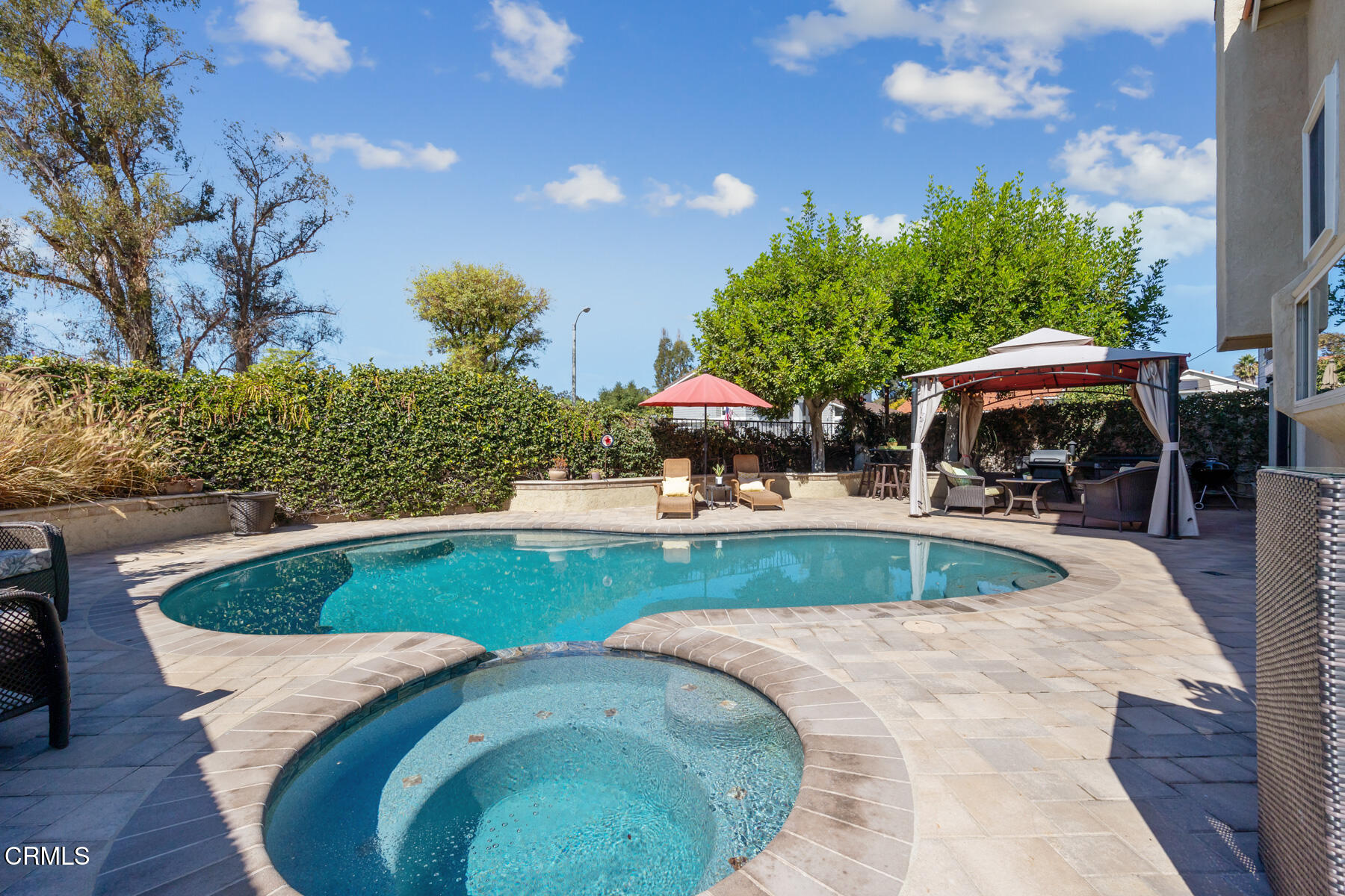 22671 Cheryl Way Lake Forest, CA 92630 - Photo 44 of 51 a view of a swimming pool with an outdoor space and seating area