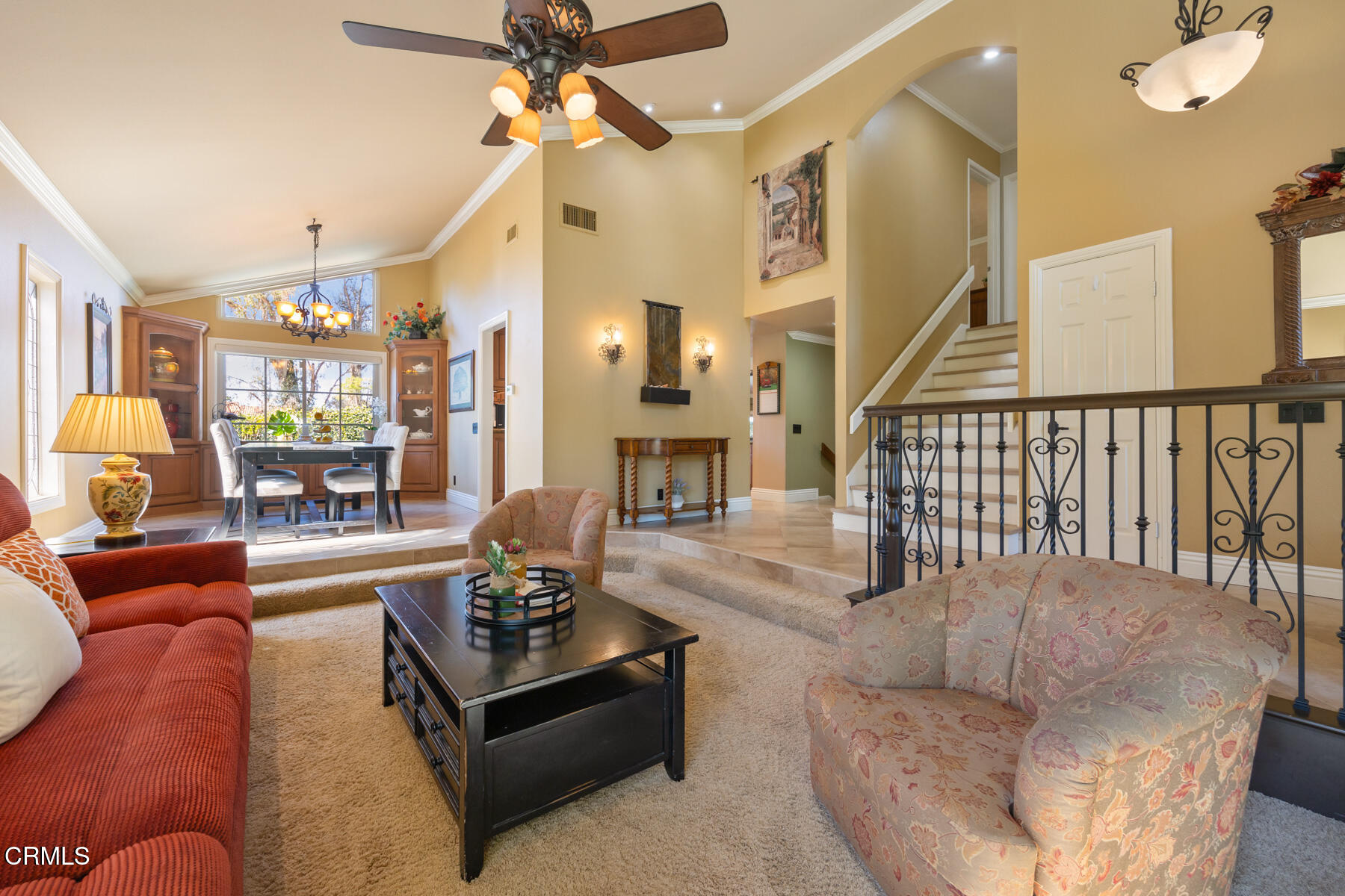 22671 Cheryl Way Lake Forest, CA 92630 - Photo 6 of 51 a living room with furniture fireplace and a chandelier