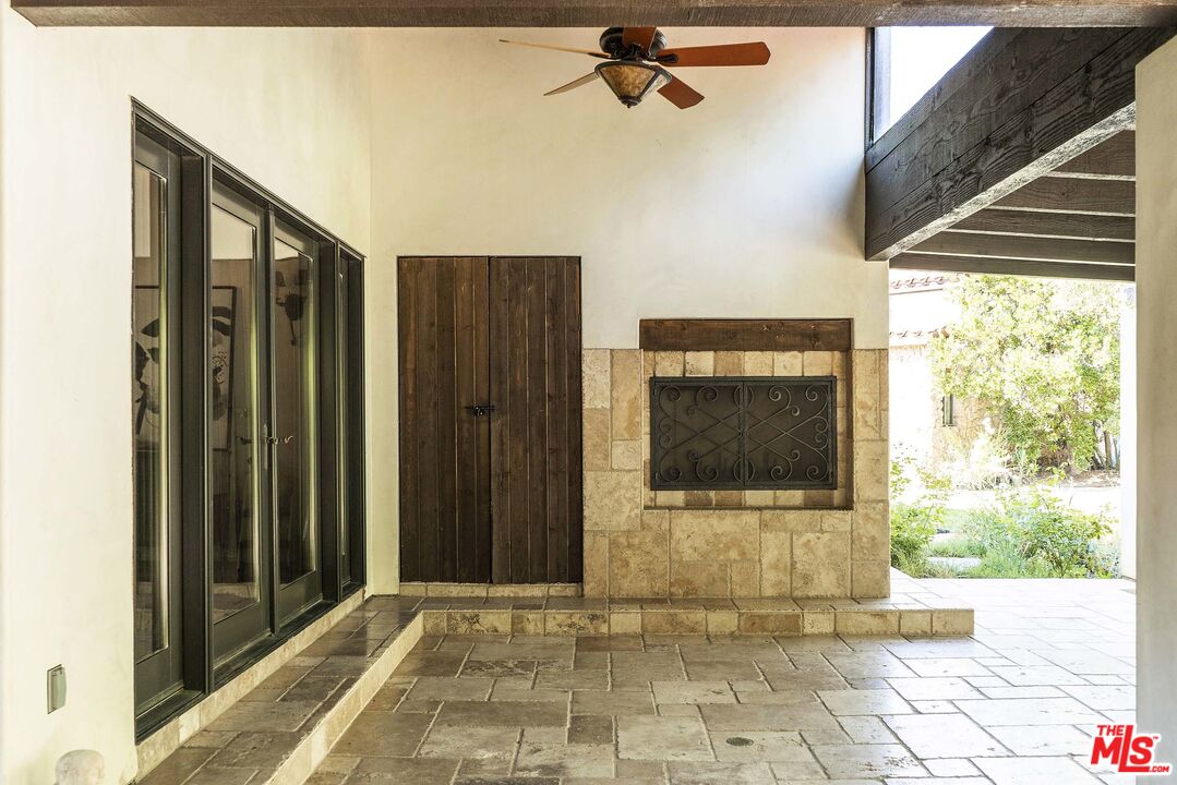 2251 Cold Canyon Road Calabasas, CA 91302 - Photo 38 of 47 a view of a entryway door with wooden floor