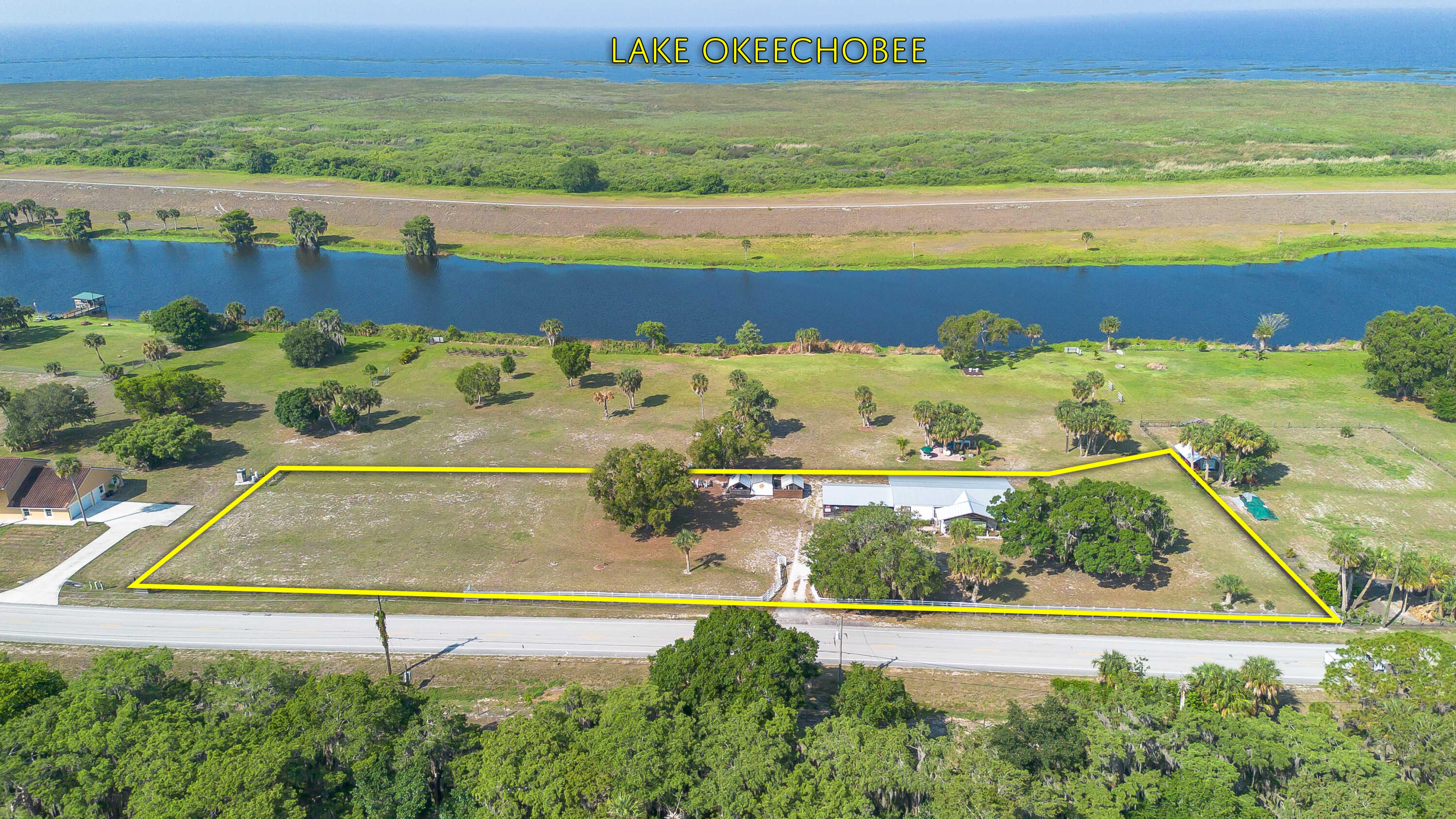 12302 Highway 441 Okeechobee, FL 34974 - Photo 2 of 63 a view of an outdoor space with a lake view
