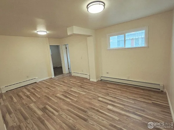 a kitchen with stainless steel appliances granite countertop a stove and a refrigerator