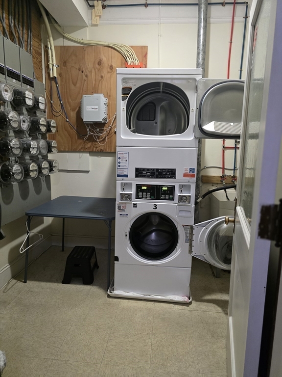 354 North Main Street, Unit 214 Andover, MA 01810 - Photo 12 of 33 a utility room with sink dryer and washer