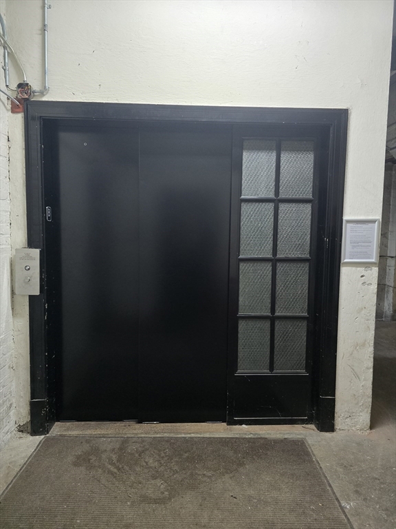 354 North Main Street, Unit 214 Andover, MA 01810 - Photo 20 of 33 a view of wooden door